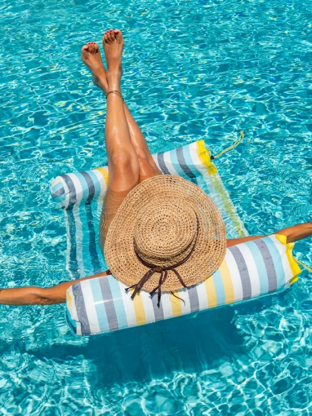 woman in luxury five stars spa resort in the swimming pool.